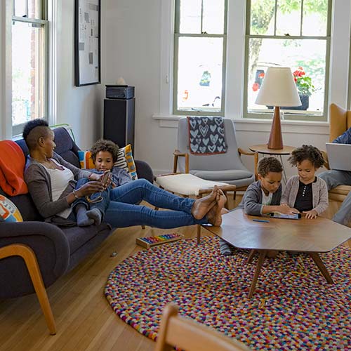 A family relaxes in their home