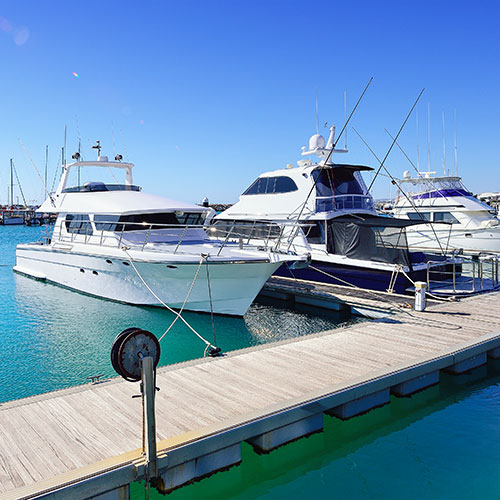 Boats are docked at a pier